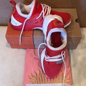 Men’s red Nike runners - good condition